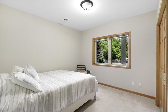 10941 Woodland Drive N, Champlin, MN 55316