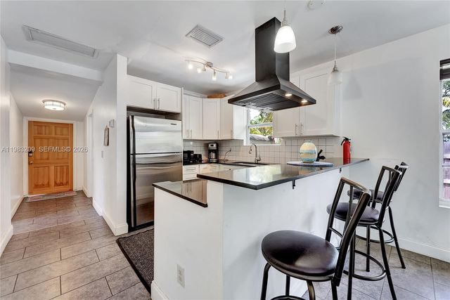 107 Stirling Road, Dania Beach, FL 33004