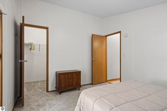 8761 Partridge Lane, Mancelona, MI 49659