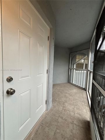 15655 SW 74th Cir Dr 14-6, Miami, FL 33193