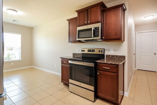 12066 Quartersawn Lane, Pinehurst, TX 77362