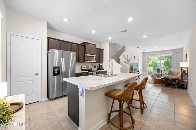 585 RUNNING WOODS Street, Orange Park, FL 32065