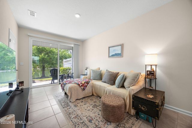 585 RUNNING WOODS Street, Orange Park, FL 32065