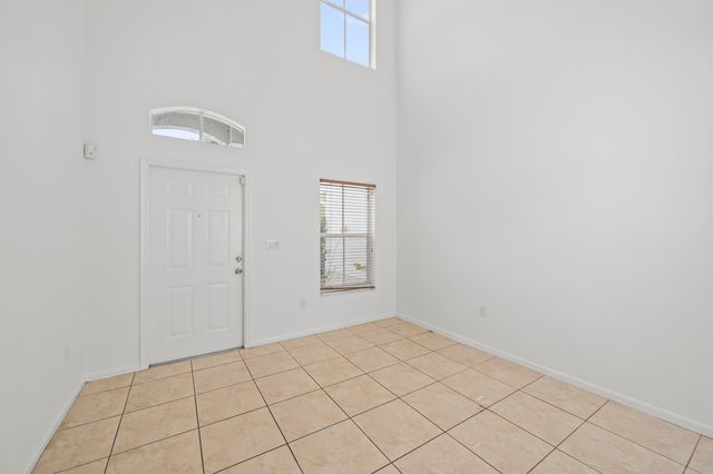 304 N Palm Villas Way, Palm Springs, FL 33461