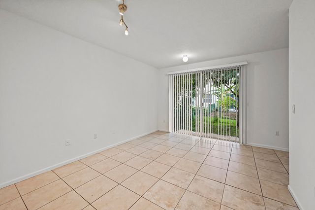 304 N Palm Villas Way, Palm Springs, FL 33461