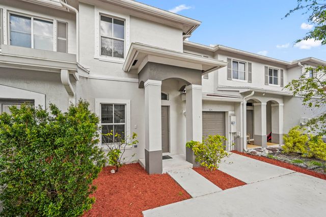 304 N Palm Villas Way, Palm Springs, FL 33461