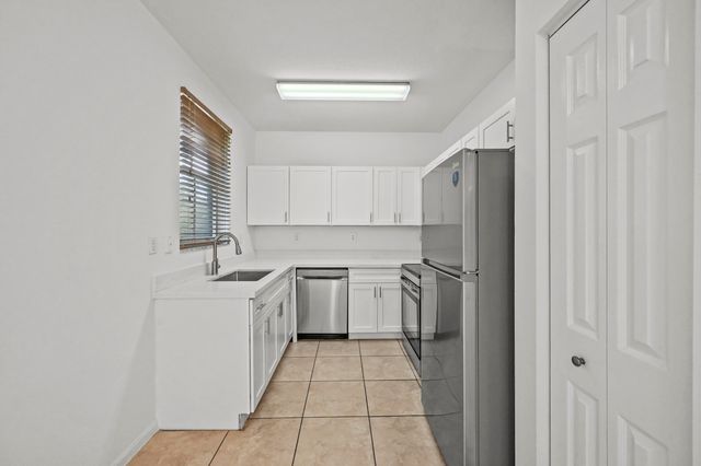 304 N Palm Villas Way, Palm Springs, FL 33461