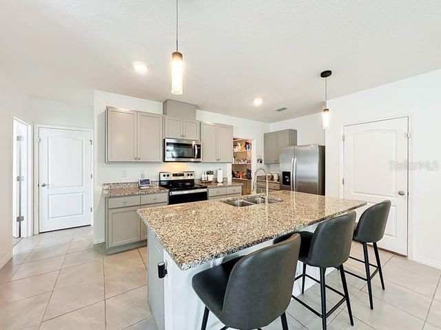 1157 CASCADES AVENUE, Davenport, FL 33837