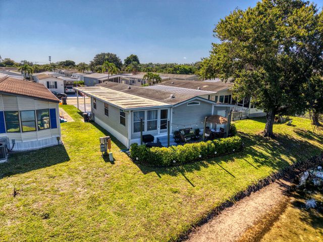 153 Palm Beach Plantation Boulevard, Lake Worth, FL 33467