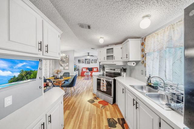 153 Palm Beach Plantation Boulevard, Lake Worth, FL 33467