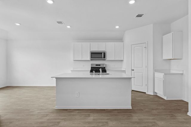 12117 Horseshoe Field BND, Mustang Ridge, TX 78610