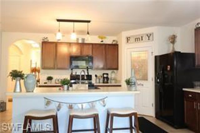 10548 Canal Brook LN, Lehigh Acres, FL 33936