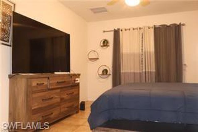 10548 Canal Brook LN, Lehigh Acres, FL 33936