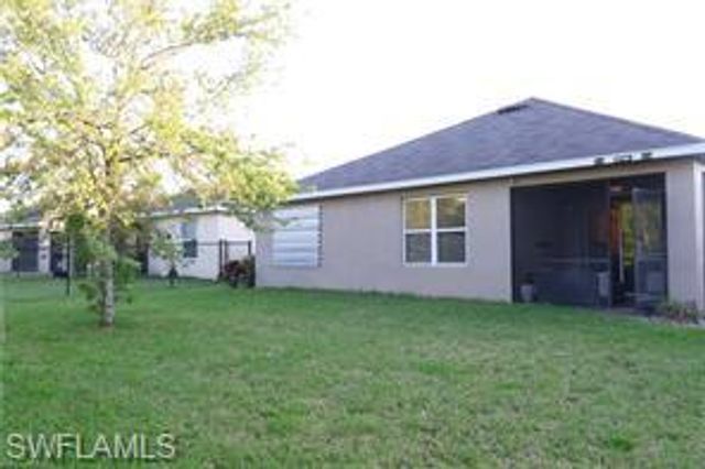 10548 Canal Brook LN, Lehigh Acres, FL 33936
