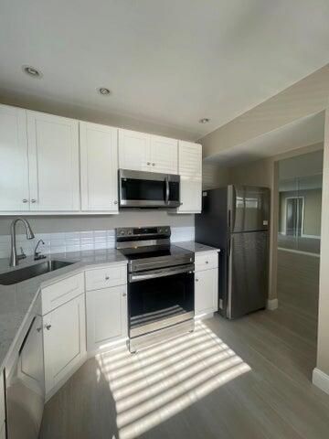 19 Colonial Club Drive 200, Boynton Beach, FL 33435