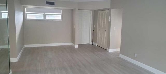 19 Colonial Club Drive 200, Boynton Beach, FL 33435