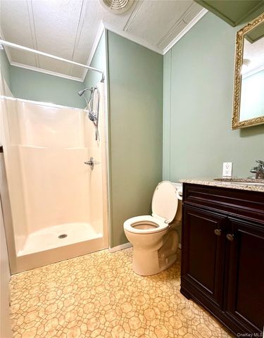 16 Village Circle E, Manorville, NY 11949