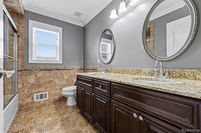 18011 Humber Bridge Drive, Macomb Township, MI 48042