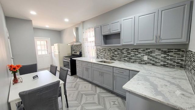 9425 40th Drive, Elmhurst, NY 11373