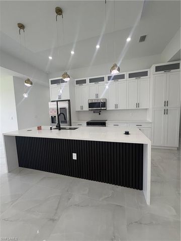 869 Christy ST E, Lehigh Acres, FL 33974