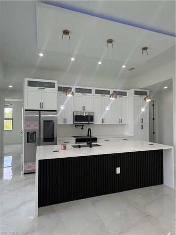 869 Christy ST E, Lehigh Acres, FL 33974