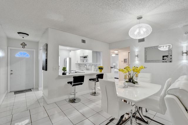 130 LAKE MERYL Drive 227, West Palm Beach, FL 33411