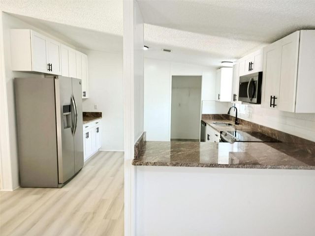 4209 LOURY DRIVE, Wesley Chapel, FL 33543