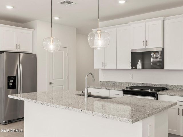 17566 W WOODLANDS Avenue, Goodyear, AZ 85338