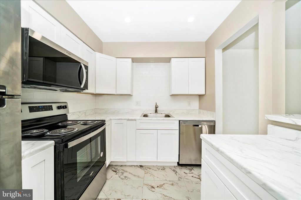 Image 16 of property listing at 10125 PRINCE PL #103-11B, Upper Marlboro, MD 20774