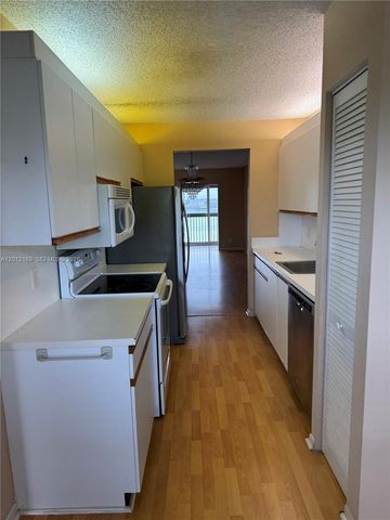 12950 SW 13th St 412D, Pembroke Pines, FL 33027