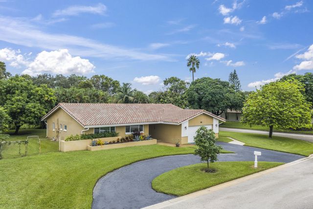 992 NW 83RD Drive, Coral Springs, FL 33071