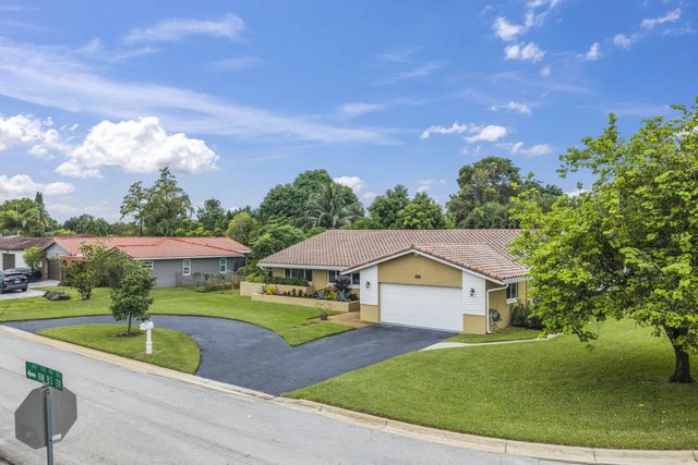 992 NW 83RD Drive, Coral Springs, FL 33071