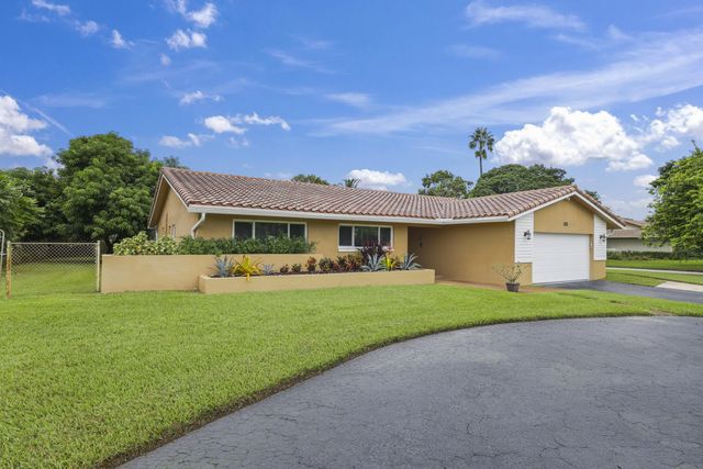 992 NW 83RD Drive, Coral Springs, FL 33071