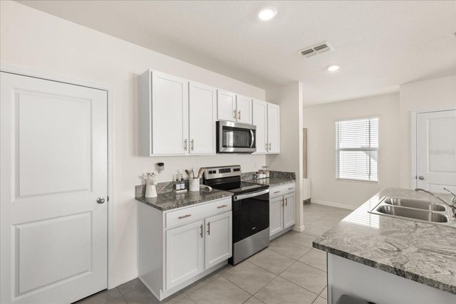 5640 WANDERING WILLOW DRIVE, Wesley Chapel, FL 33545