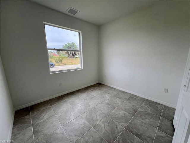628 Falls LN, Lehigh Acres, FL 33974