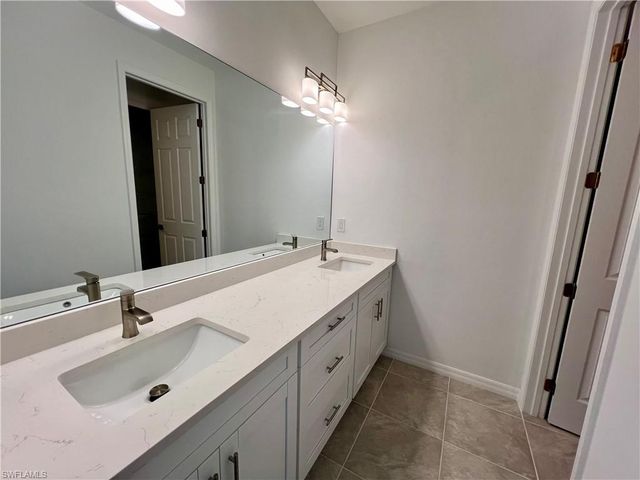 628 Falls LN, Lehigh Acres, FL 33974