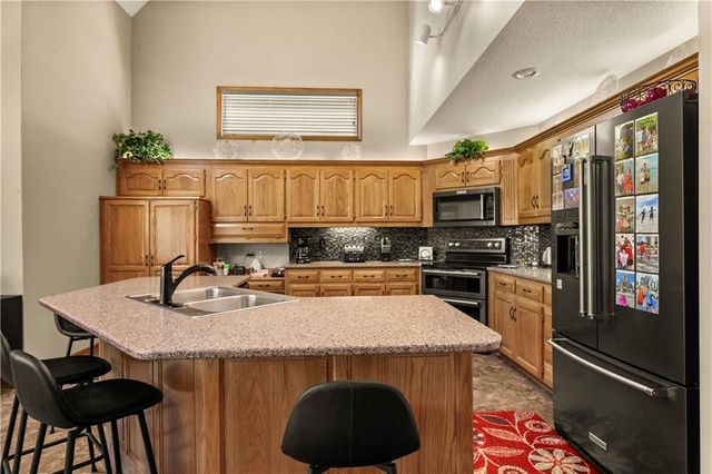 1124 NE Waterfield Village Drive, Blue Springs, MO 64014