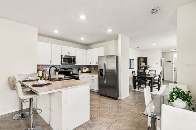 1956 EGRET MEADOWS AVENUE, Kissimmee, FL 34744