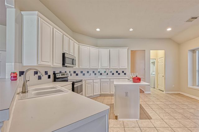 23646 Hawkins Creek Court, Katy, TX 77494