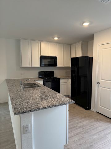 11719 Bone Spring Drive, Rhome, TX 76247