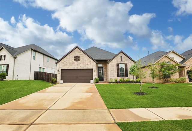 1329 Knollbridge Point Lane, Pinehurst, TX 77362