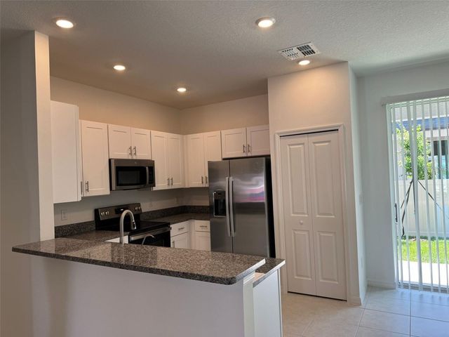 10375 TRUMPET HONEYSUCKLE WAY, San Antonio, FL 33576