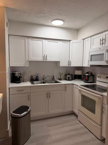 5055 NW 7th St 405, Miami, FL 33126