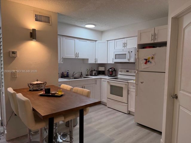 5055 NW 7th St 405, Miami, FL 33126