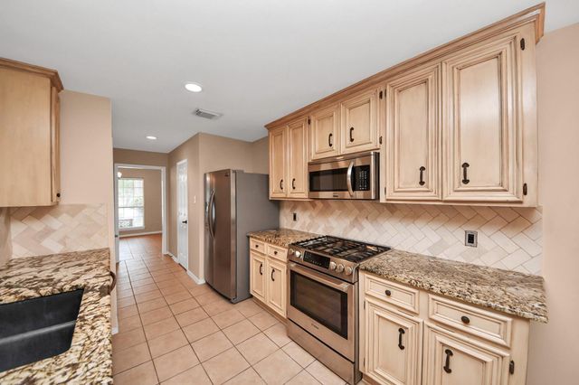 12706 Wolf Creek Court, Humble, TX 77346