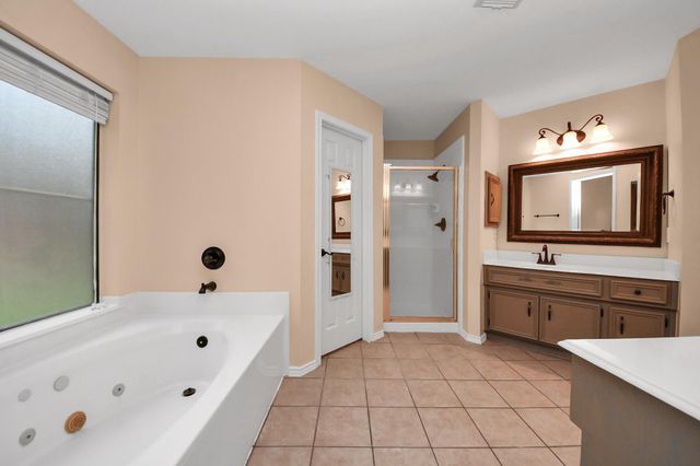 12706 Wolf Creek Court, Humble, TX 77346