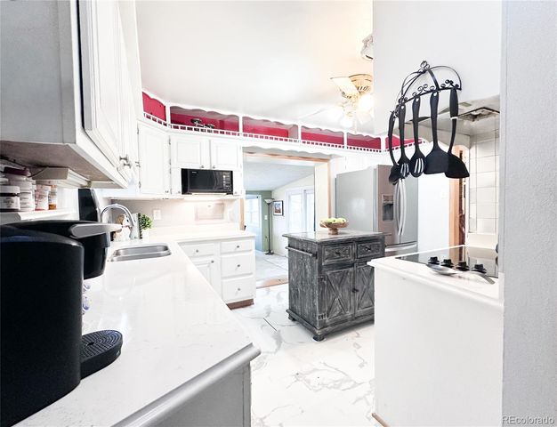 2906 S Stuart Street, Denver, CO 80236