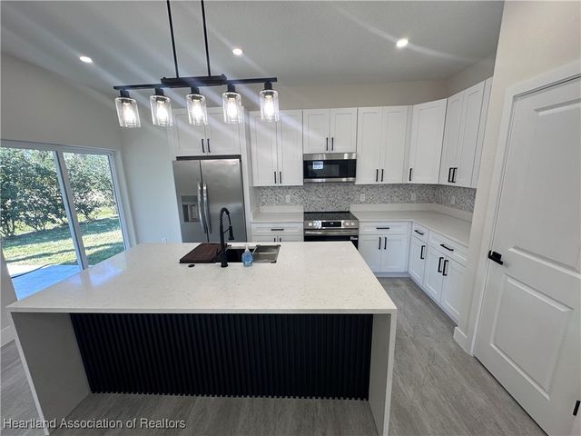 619 Aston-Martin Drive, Sebring, FL 33872