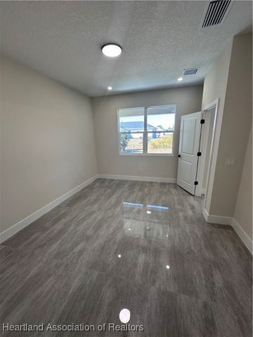 619 Aston-Martin Drive, Sebring, FL 33872