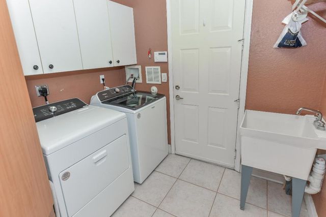 9740 Egret Chase Lane, West Palm Beach, FL 33411